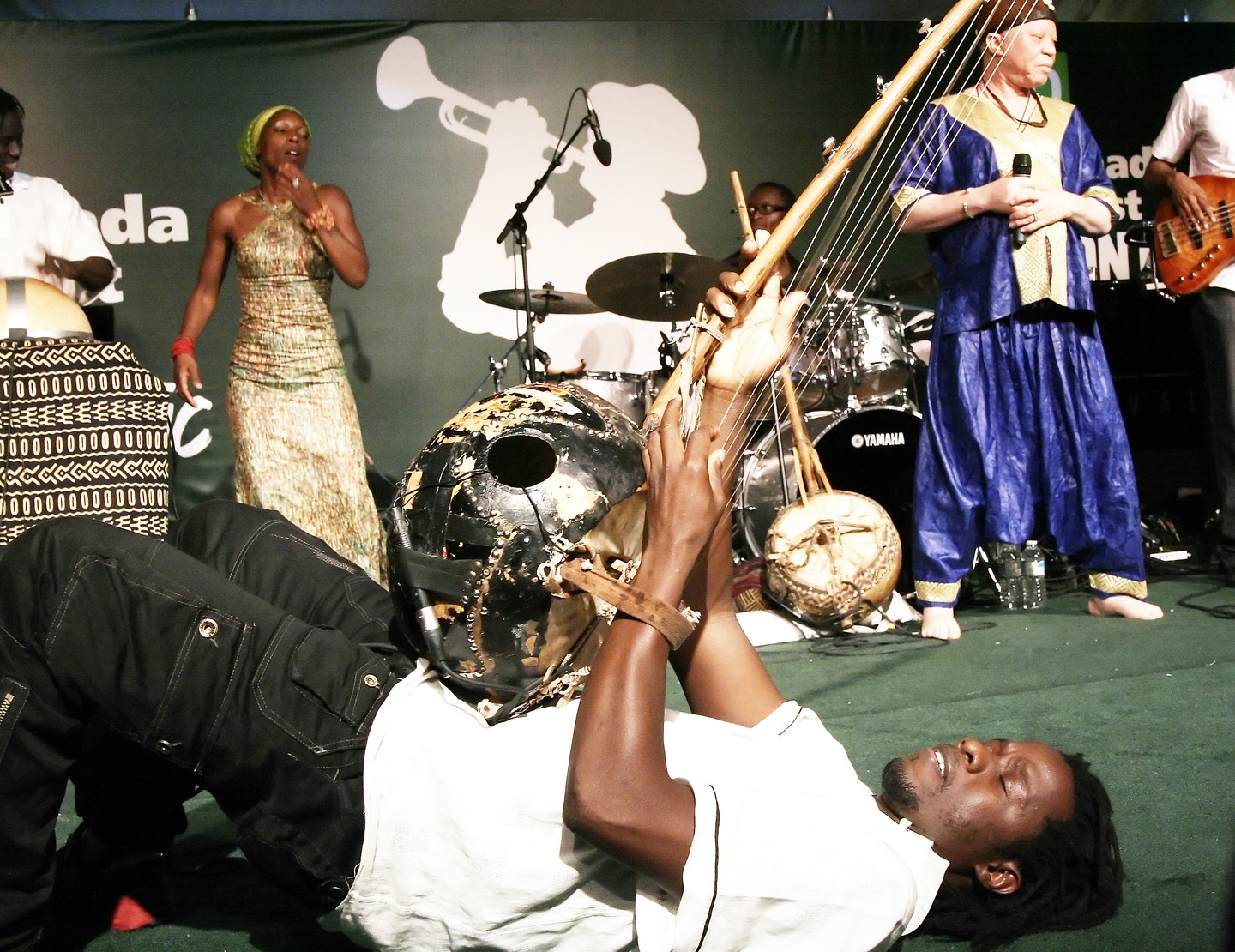 Salif Keita singing and playing guitar at the Toronto Jazz Festival in June 2008