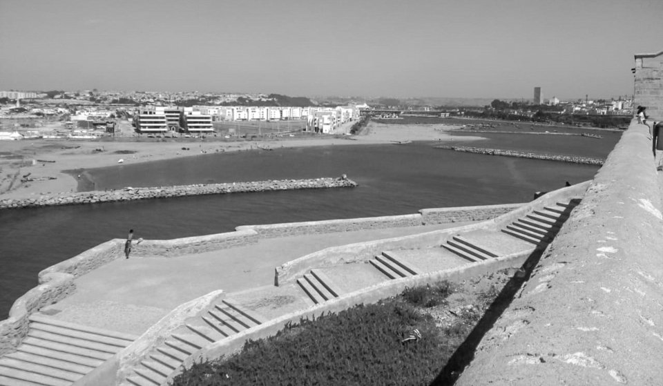 Archival black-and-white view of Rabat’s Bouregreg waterfront from the Kasbah of the Udayas in July 2020