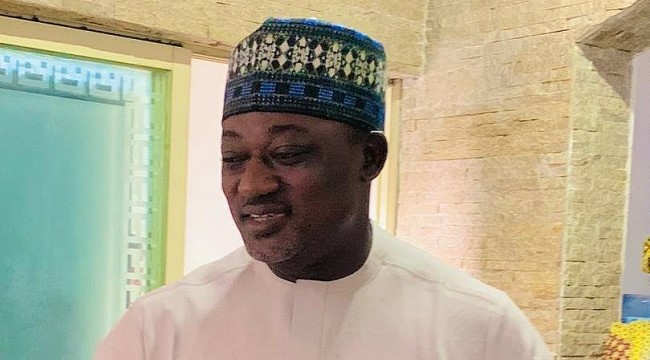 Joshua Ishaku Musa, chairman of Bwari Area Council, wearing a traditional cap and white clothing in a photograph credited to his named Facebook account.