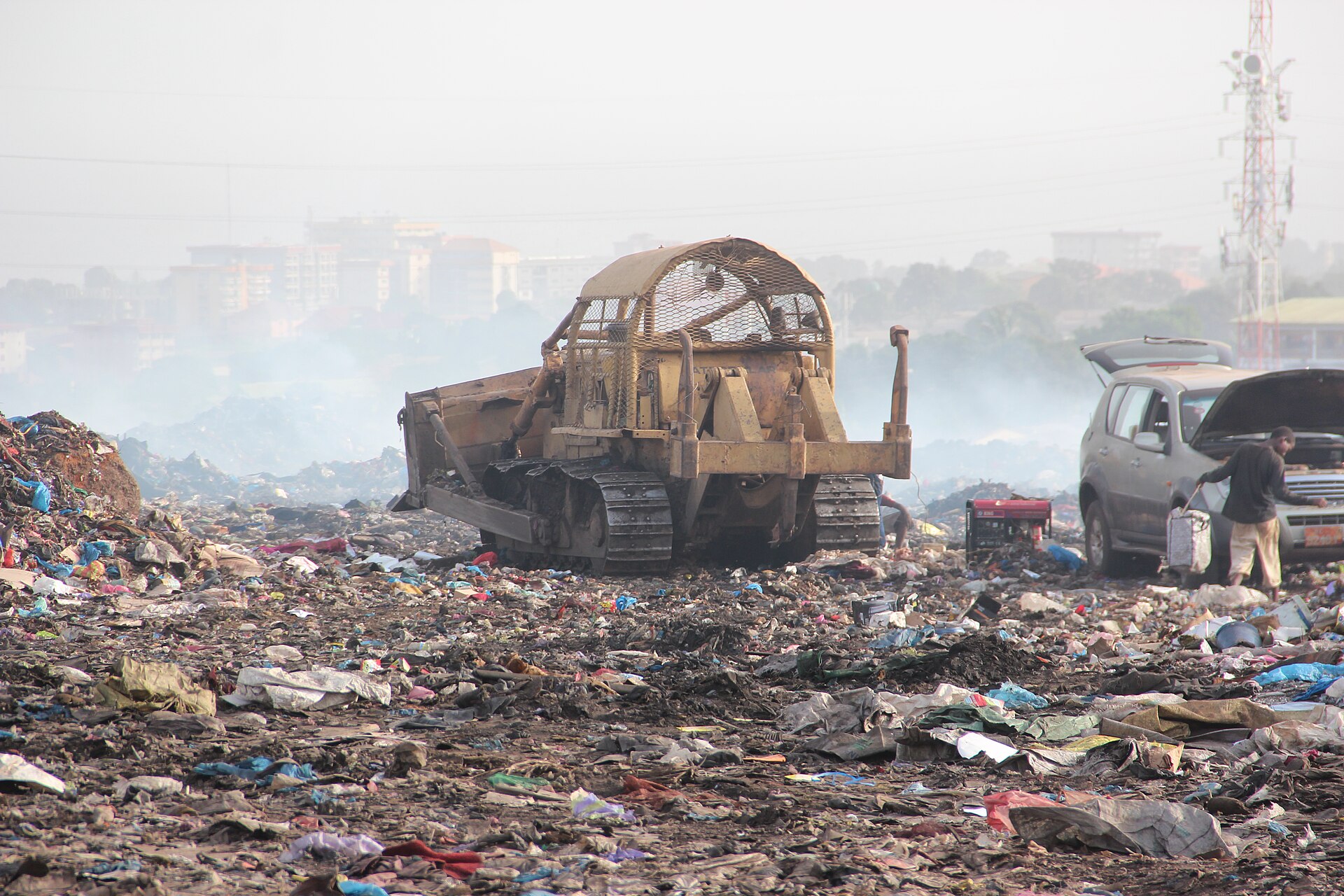 Waste-compacting machinery working at the Dar-es-Salam landfill in Conakry, Guinea